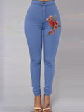 Jeans magri da ricamo floreale rosso